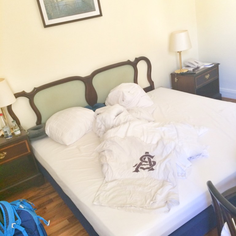 Matt retiring his old ASU shirt that he wore on the plane- no room in the backpacks for extras!