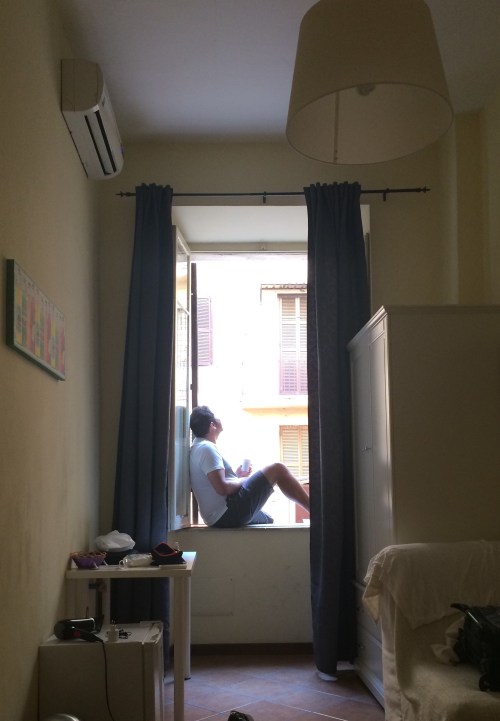 I need to explain why I like sitting in windows. it is not just sitting in the window, it is the whole experience of getting to that window. I wake up before Marissa and sneak out without waking her and walk to the cafe or bakery. I am not sure why, but when walking to do such a mundane thing as grab the morning coffee makes me feel as if I am part of the city and not someone visiting the city. Europeans love their coffee and it isnt like walking to a starbucks, I look for a small cafe that is busy, usually have an espresso there and just watch people come in and out, i just enjoy it. After the espresso, I'll get 2 americanos and, 2 croissants to go, walk back to the room,  sneak back in, place hers next to her bed so the smell wakes her up, then take my place in the window and just watch the city happen...I just love it.